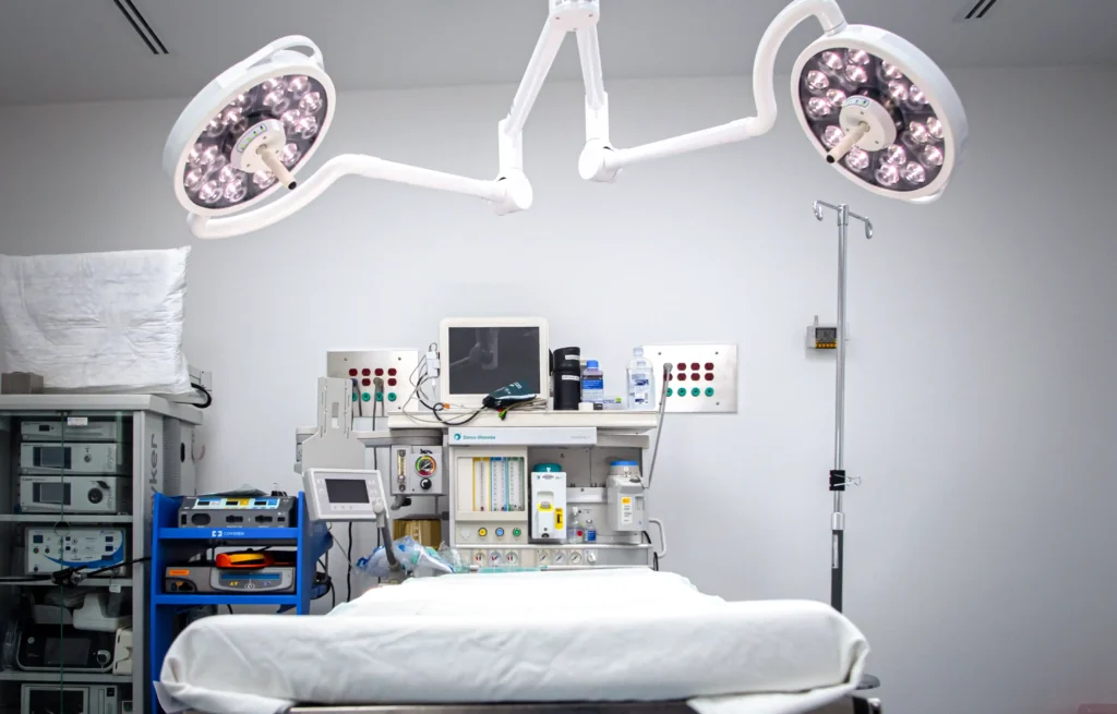State-of-the-art sterile operating room with advanced surgical lighting and monitoring equipment in Tijuana, Mexico.
